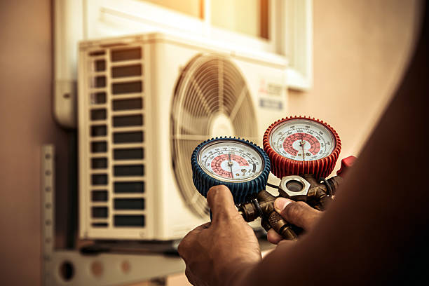 Professional Air Conditioning Service technician working in South Beloit, IL